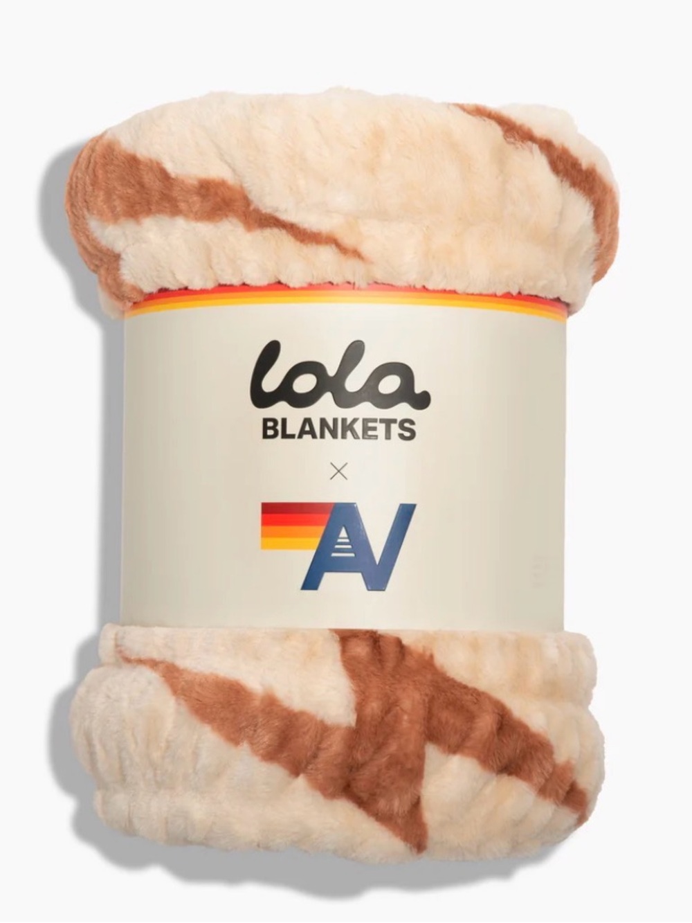 lola Faux Fur blanket in beige and copper bolts